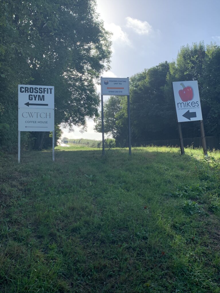 Signs at entrance to Church End Farm facing Bishop's Stortford direction